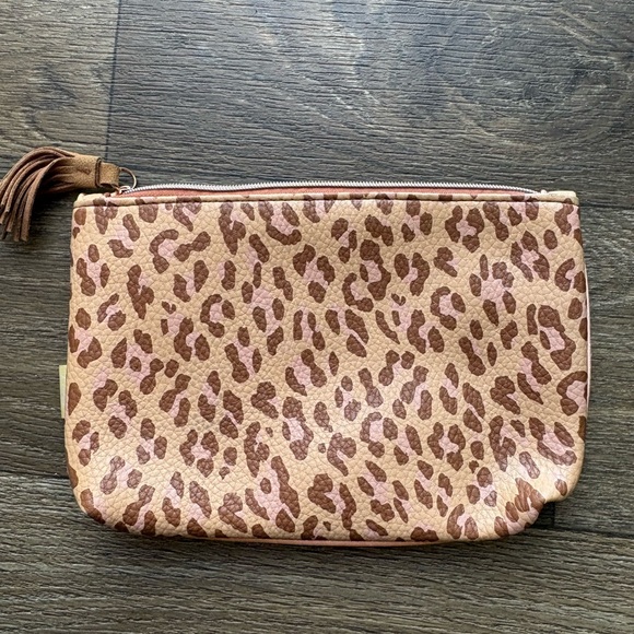 ipsy Handbags - ipsy Leopard Print Pouch with Tassel